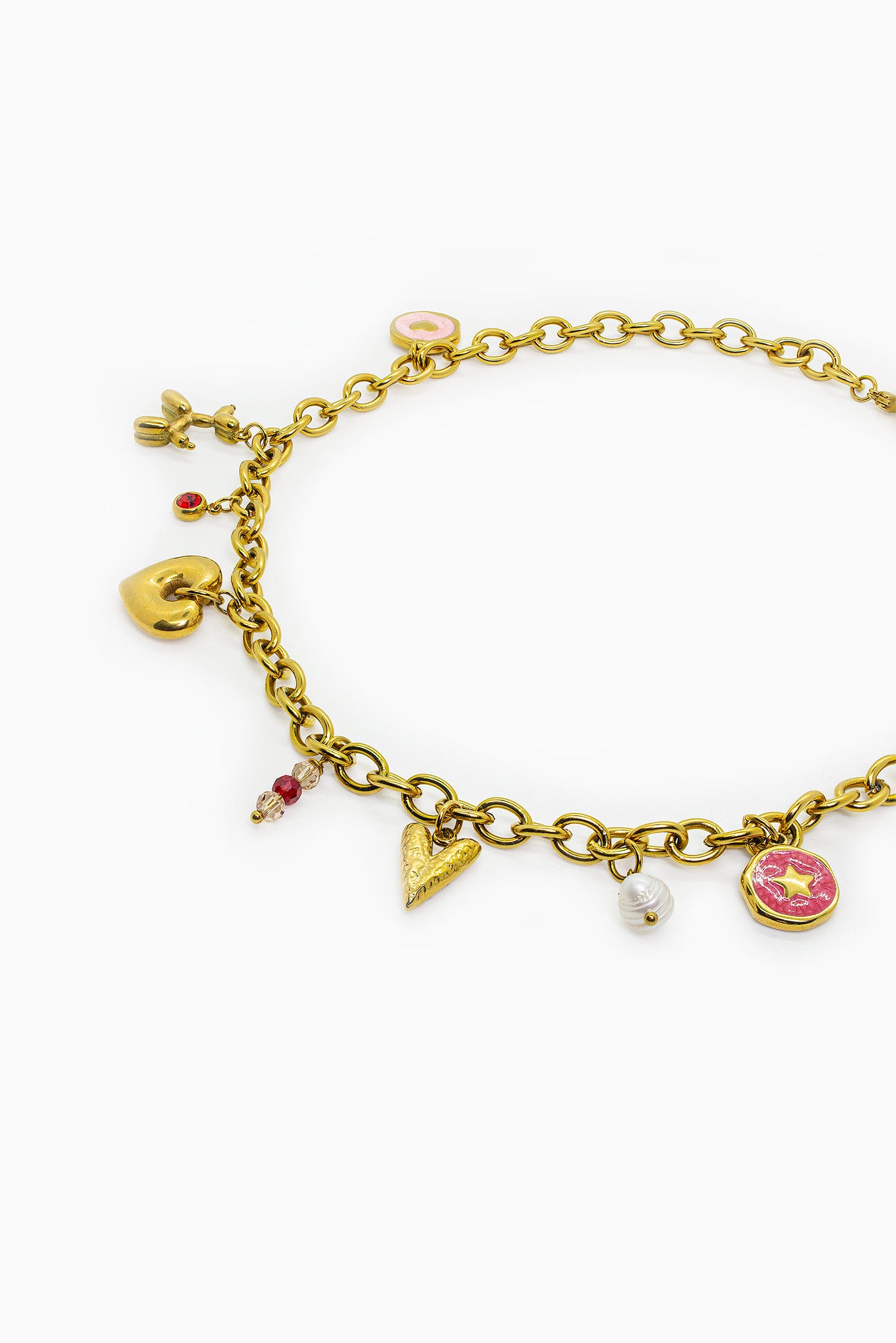 Zlatý náhrdelník se srdíčkem a drobnými přívěsky