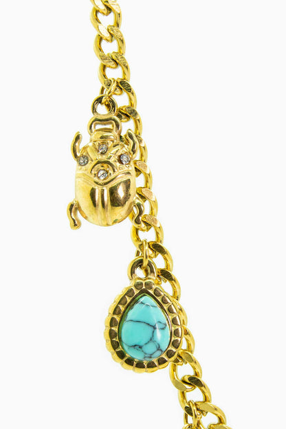 Náhrdelník s lvem a tyrkysovými akcenty a krystalovými detaily